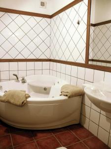 Ett badrum på Le Village