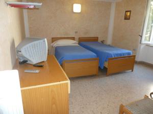 Postel nebo postele na pokoji v ubytování Hotel Bolognese