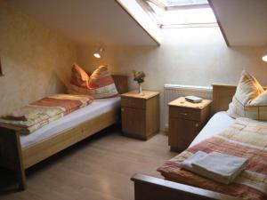 Cama o camas de una habitación en Gästehaus Zieserl