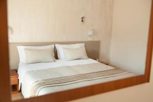 Postel nebo postele na pokoji v ubytování Hotel Fabbrini