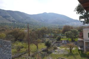 a view of a valley with mountains in the background at "STELIOS & GALINI" in Symi