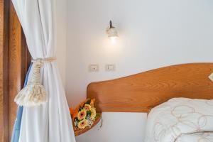 Rifugio Gorropu客房内的一张或多张床位
