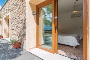 Rifugio Gorropu客房内的一张或多张床位