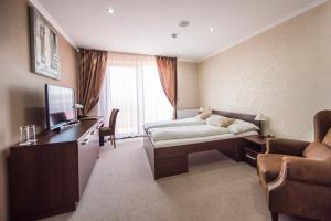 TV a/nebo společenská místnost v ubytování Hotel Galanta