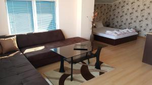 A bed or beds in a room at Exotic Guest House