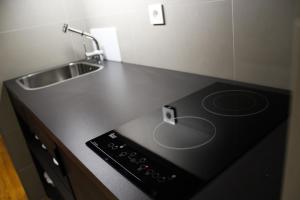 Кухня или мини-кухня в Apartamentos Turisticos Paraiso
 +37 фотографий