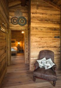 A bed or beds in a room at Ledro Mountain Chalet