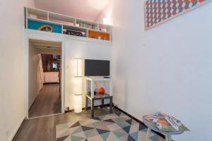 a room with a loft bed and a living room at Apartment Pierre Scize Sur La Saône in Lyon