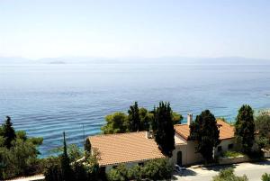 a house with a view of the ocean at Klonos Anna in Egina