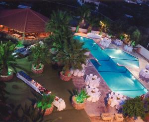 an overhead view of a swimming pool at a resort at Klonos Anna in Egina