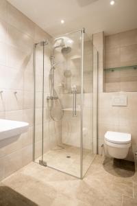 Kylpyhuone majoituspaikassa BSW Hotel Isarwinkel