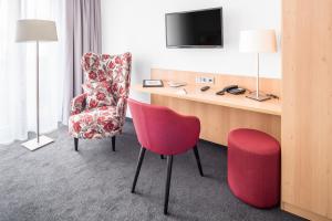 TV a/nebo společenská místnost v ubytování BSW Hotel Isarwinkel