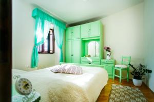 Postel nebo postele na pokoji v ubytování Apartman uz More
