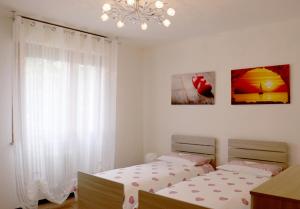 A bed or beds in a room at Appartamenti Giacomo Noventa