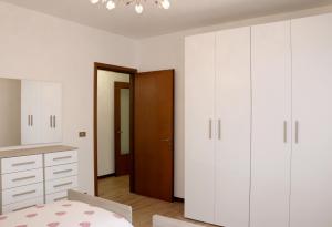 A bed or beds in a room at Appartamenti Giacomo Noventa