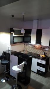 Nhà bếp/bếp nhỏ tại Roini Apartment