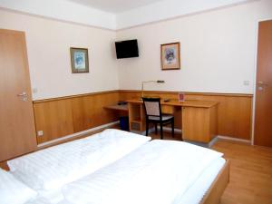 Łóżko lub łóżka w pokoju w obiekcie Wohnen beim Bäcker Weinberger