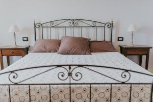 Ein Bett oder Betten in einem Zimmer der Unterkunft Il Casale Bedrooms