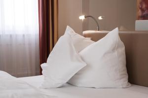 Postel nebo postele na pokoji v ubytování Hotel Seehof