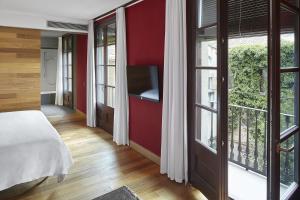 Posteľ alebo postele v izbe v ubytovaní Casa Camper Barcelona