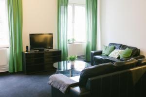 TV a/nebo společenská místnost v ubytování Sidsjö Hotell & Konferens