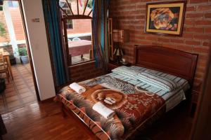 Ένα ή περισσότερα κρεβάτια σε δωμάτιο στο Hostal D´Mathias