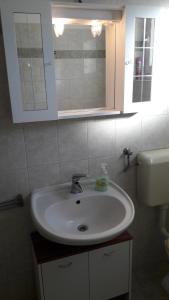Ein Badezimmer in der Unterkunft Apartments Gabriel