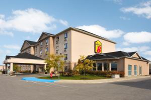 a rendering of a hotel with a parking lot at Super 8 by Wyndham Barrie South in Barrie