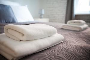 Posteľ alebo postele v izbe v ubytovaní Ego Apartments Old Town