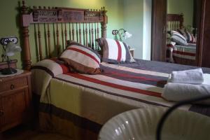 Postel nebo postele na pokoji v ubytování Casa Rural Teresa