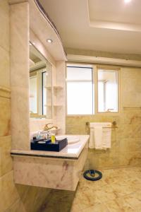 Vonios kambarys apgyvendinimo įstaigoje Hala Inn Arar Hotel