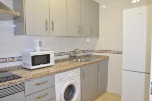 Kuchyňa alebo kuchynka v ubytovaní Apartamento San Jacinto