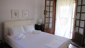 Cama o camas de una habitación en EL Villa Pelion