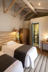 Postel nebo postele na pokoji v ubytování Abittare Hotel