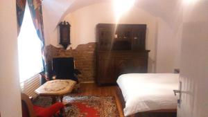 เตียงในห้องที่ Mieszkanie Old Town Apartment