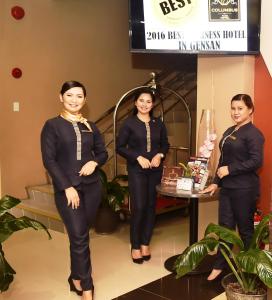 a group of three women standing in a room at Columbus Plaza Hotel in General Santos
