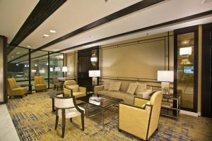 Uma área de estar em Ambassador Transit Hotel - Terminal 3
