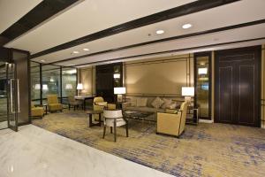 Uma área de estar em Ambassador Transit Hotel - Terminal 3