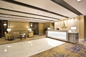 Uma área de estar em Ambassador Transit Hotel - Terminal 3