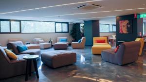 Posezení v ubytování Studio 8 Residences - Adults Only