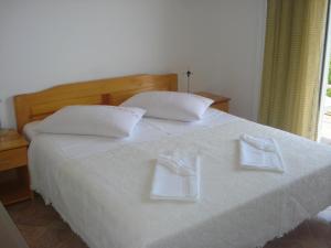 Posteľ alebo postele v izbe v ubytovaní Apartments San Giorgio