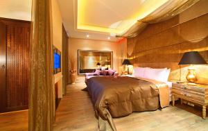 מיטה או מיטות בחדר ב-Le chateau Motel