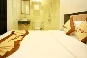 Voodi või voodid majutusasutuse May Hotel toas