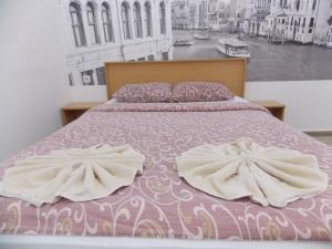 Postel nebo postele na pokoji v ubytování Hostel Stan Na Dan