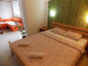 En eller flere senge i et værelse på Hostel StanNaDan