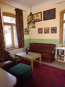 O zonă de relaxare la Hummel Hostel - Historische Stadtvilla mit Garten