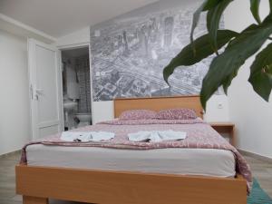 Una cama o camas en una habitación de Hostel StanNaDan