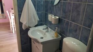 Et badeværelse på Rooms Kvestic