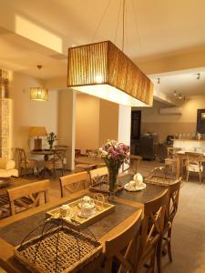 a dining room with a table and chairs at Kamares Villas in Kamáres