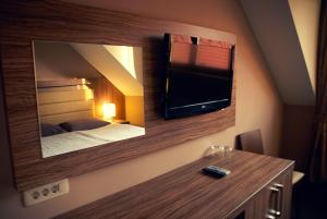 TV a/nebo společenská místnost v ubytování Hotel Opara